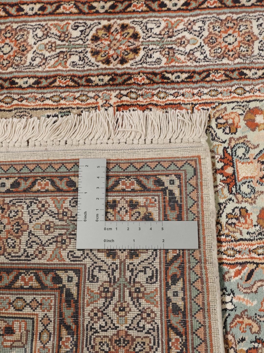 Hand-knotted Indian silk runner with intricate garden panels in multicolor