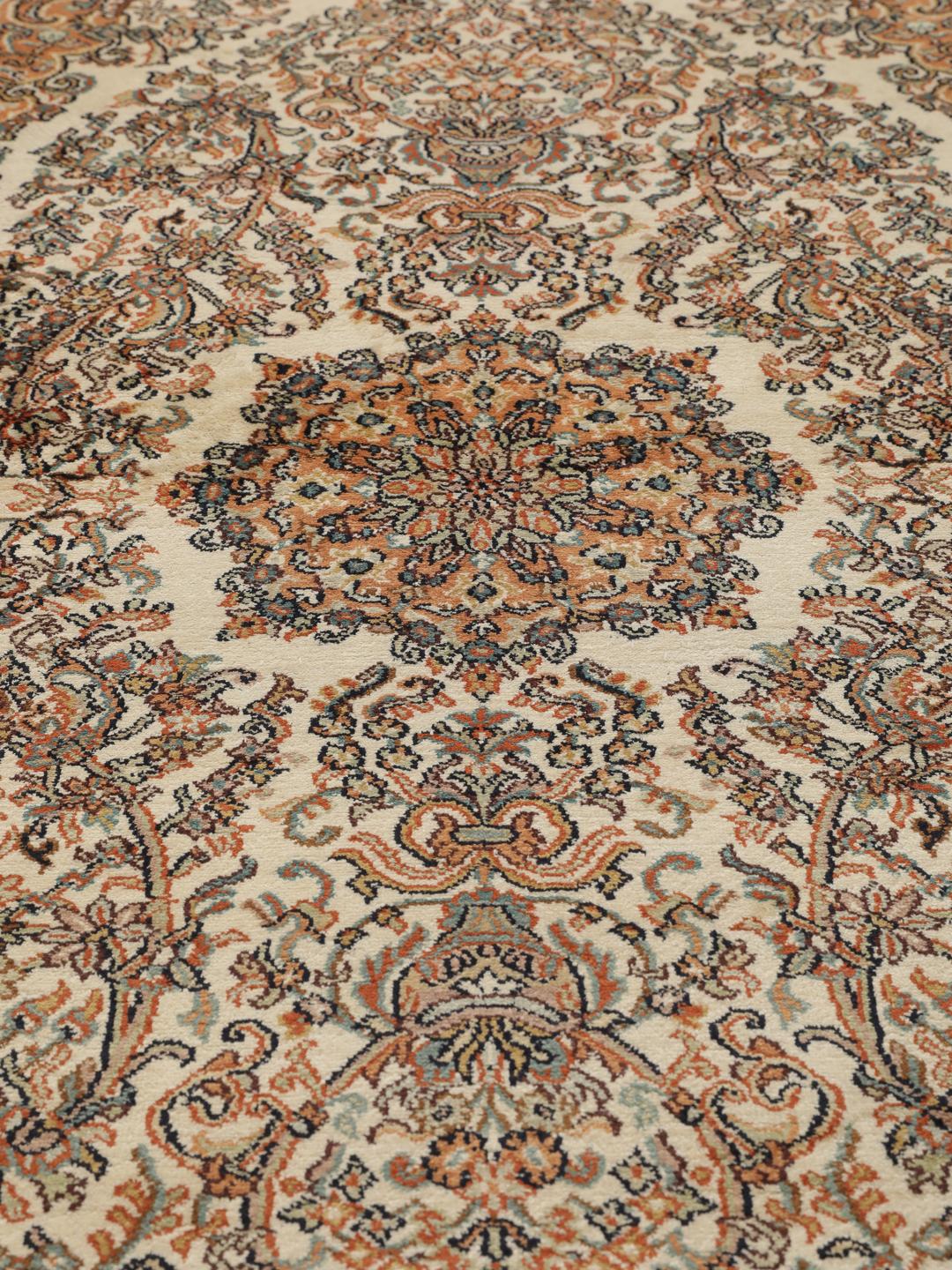 Kashmir silk rug from India with a beige and multicolor floral design