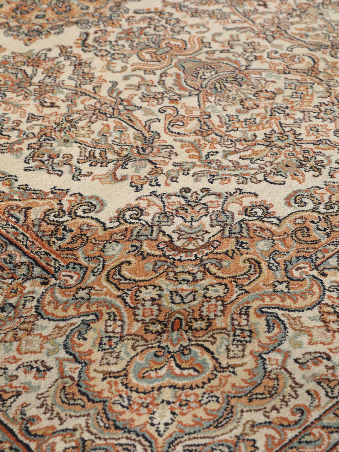 Kashmir silk rug from India with a beige and multicolor floral design