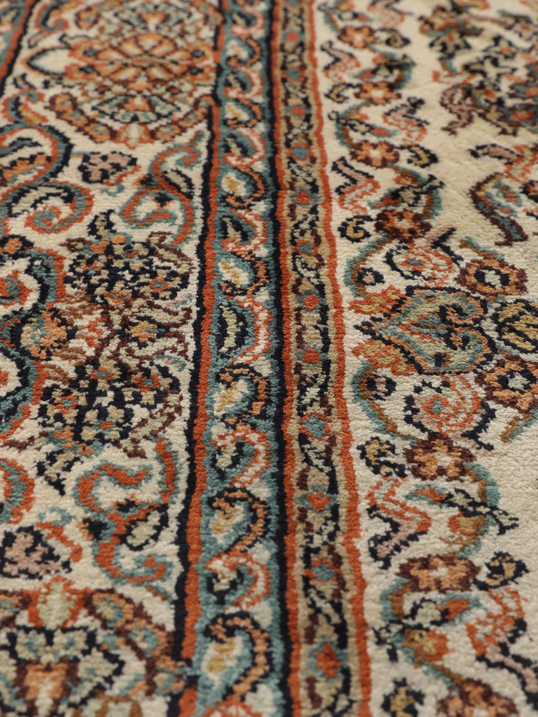 Kashmir silk rug from India with a beige and multicolor floral design