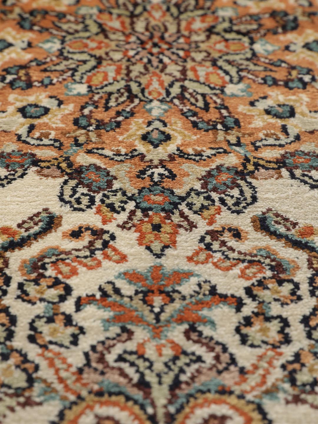 Kashmir silk rug from India with a beige and multicolor floral design