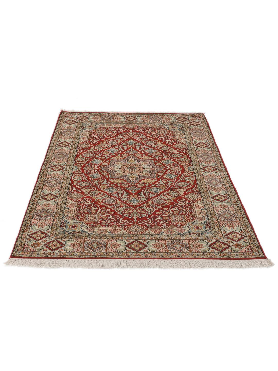 Hand-knotted Kashmir silk rug from India with a vibrant red field and intricate floral motifs.