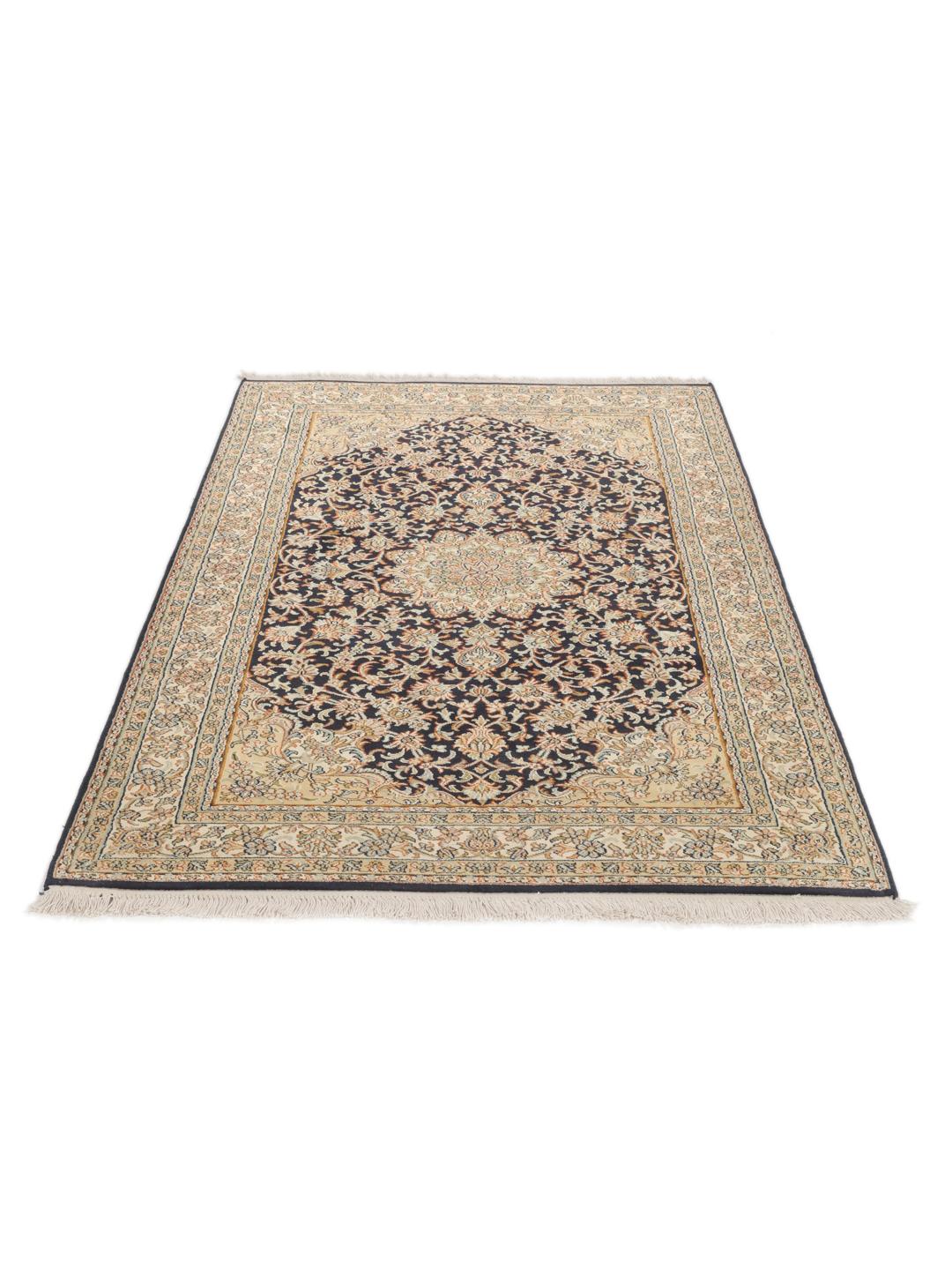 Hand-knotted Indian silk rug with intricate floral medallion patterns in blue and beige.