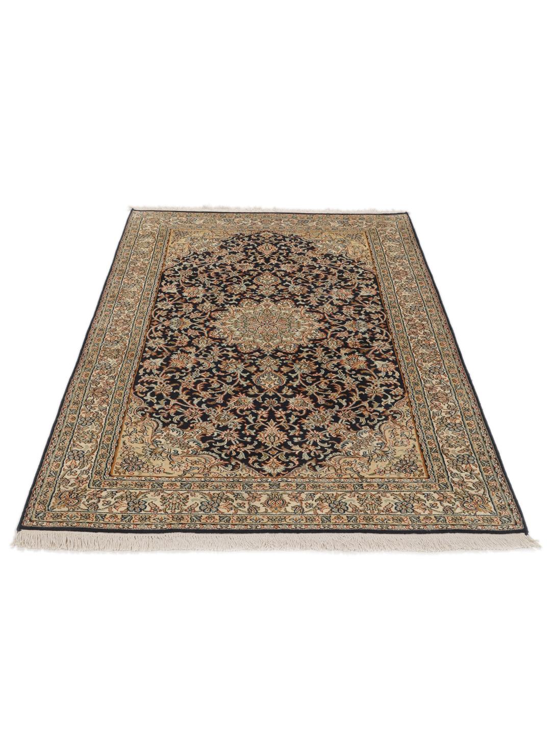 Hand-knotted Indian silk rug with intricate floral medallion patterns in blue and beige.