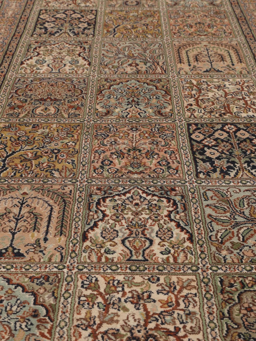 Hand-knotted Kashmir silk runner with a multicolour panelled design from India.
