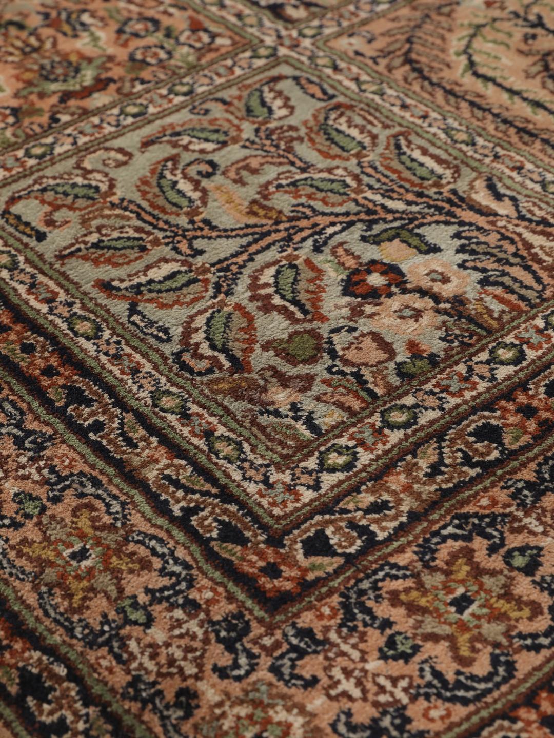 Hand-knotted Kashmir silk runner with a multicolour panelled design from India.