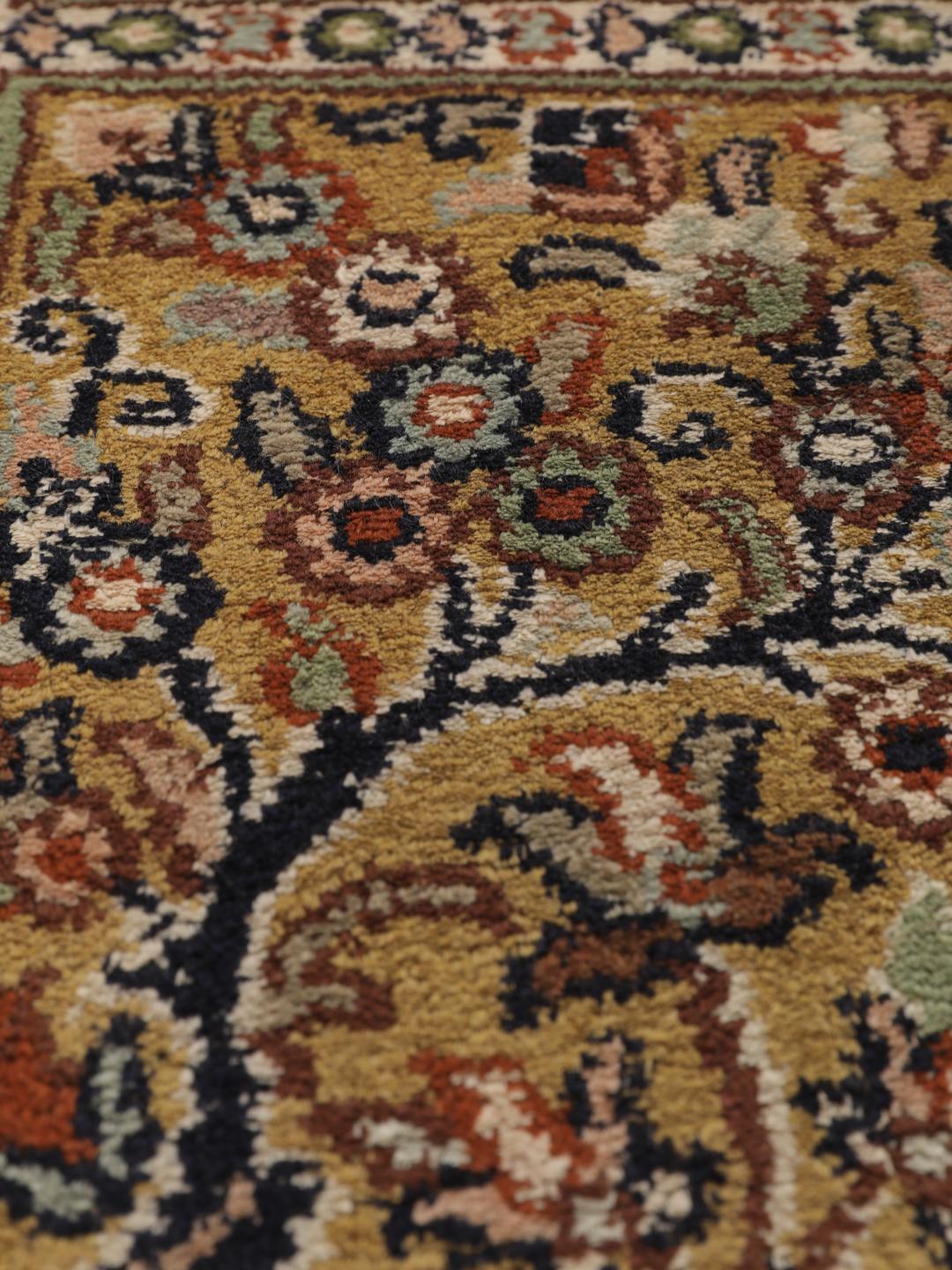 Hand-knotted Kashmir silk runner with a multicolour panelled design from India.