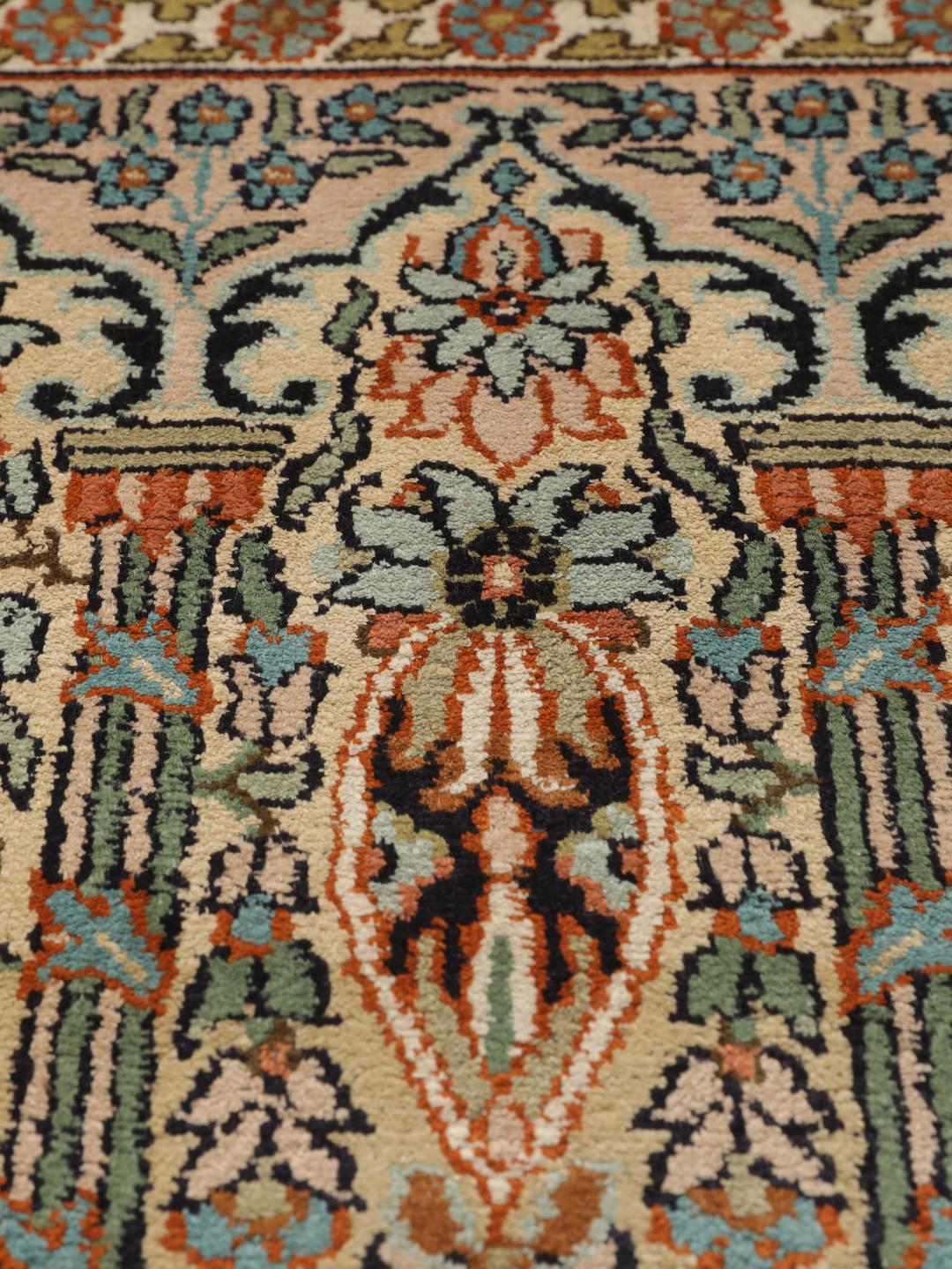 Hand-knotted Kashmir silk runner with colourful floral garden panels from India