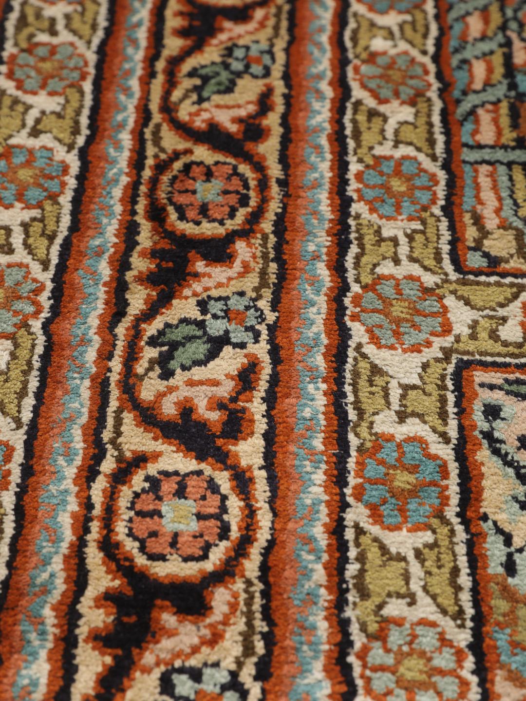 Hand-knotted Kashmir silk runner with colourful floral garden panels from India