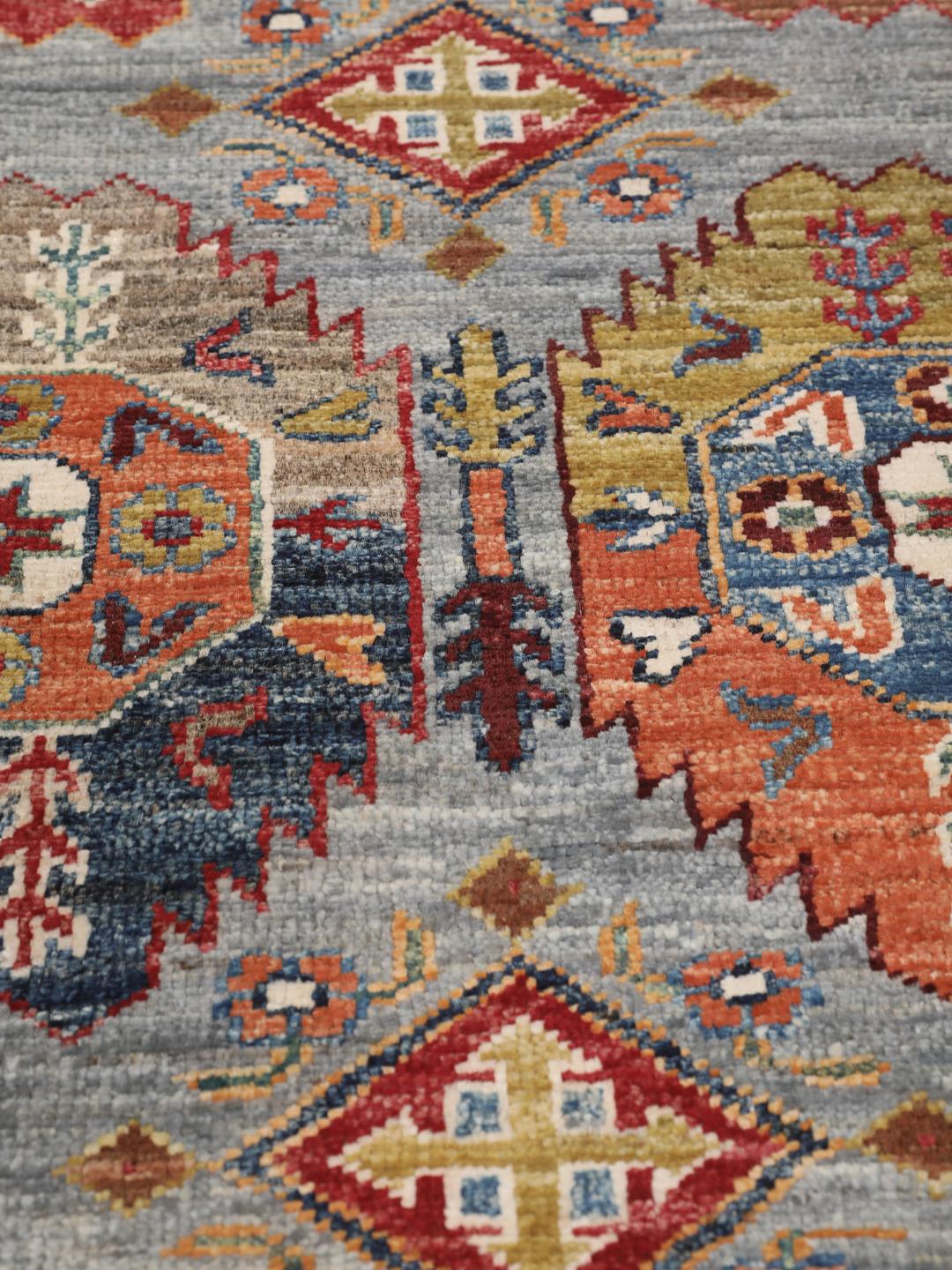 Hand-knotted runner from the Middle East in blue with geometric medallions