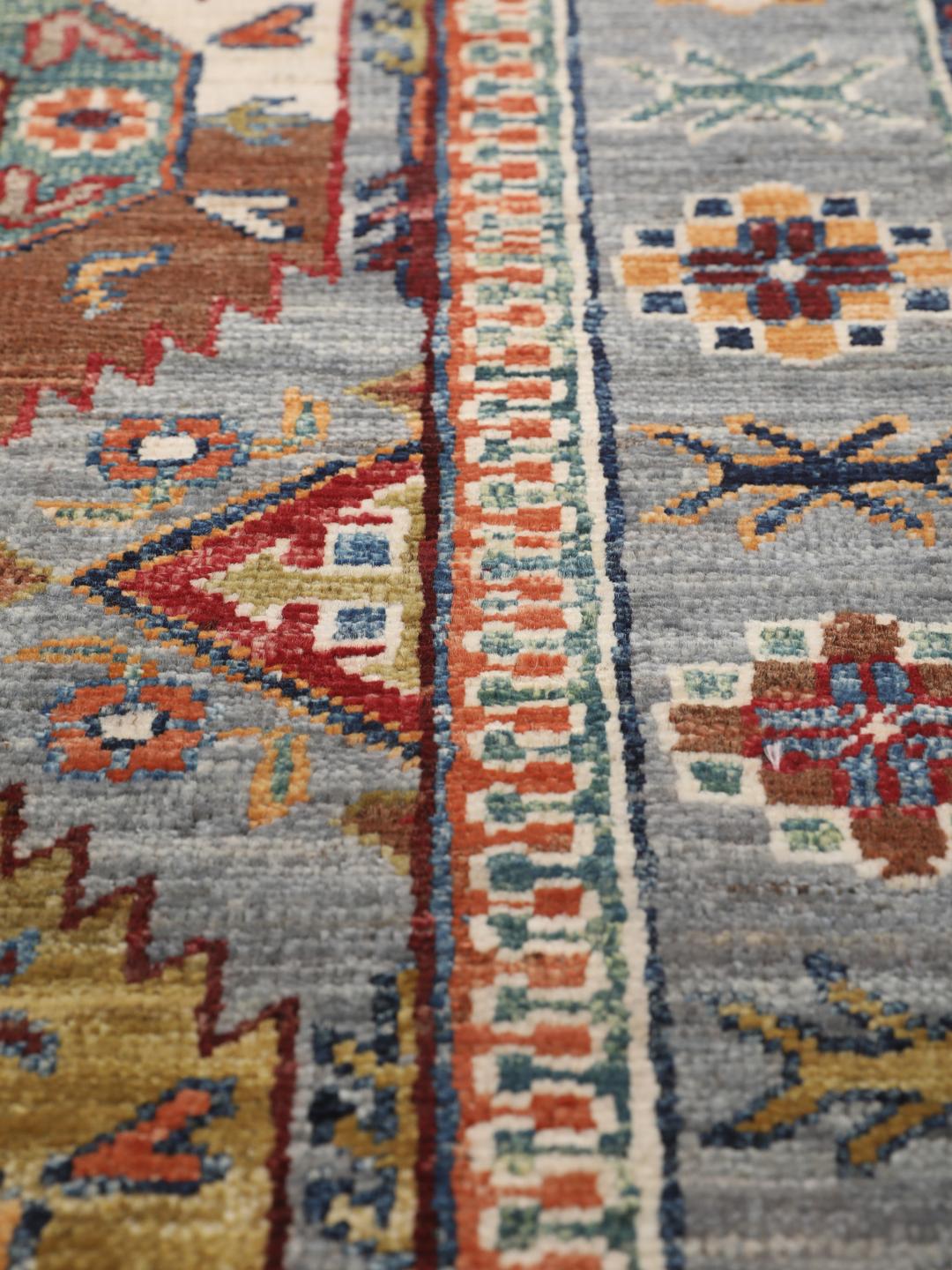 Hand-knotted runner from the Middle East in blue with geometric medallions