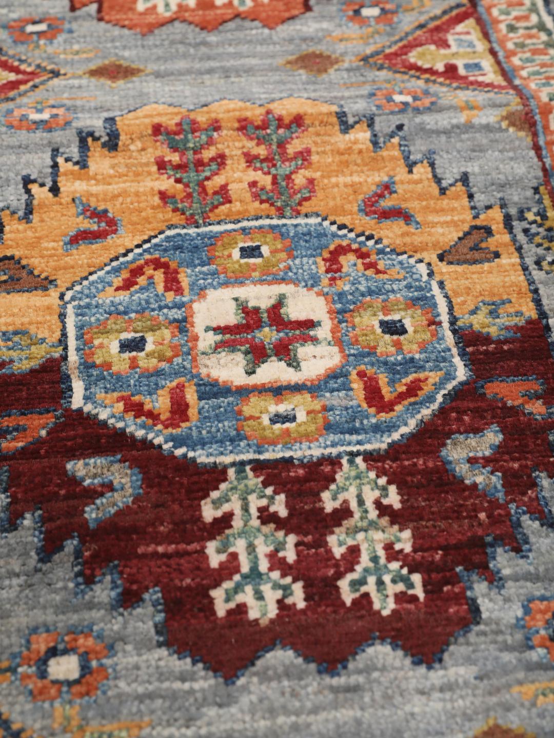 Hand-knotted runner from the Middle East in blue with geometric medallions