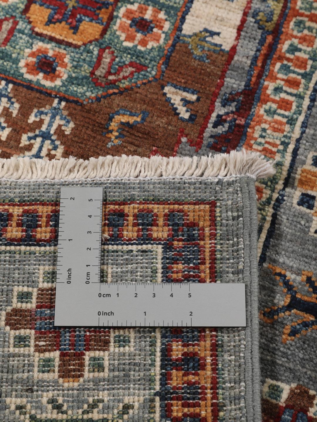 Hand-knotted runner from the Middle East in blue with geometric medallions