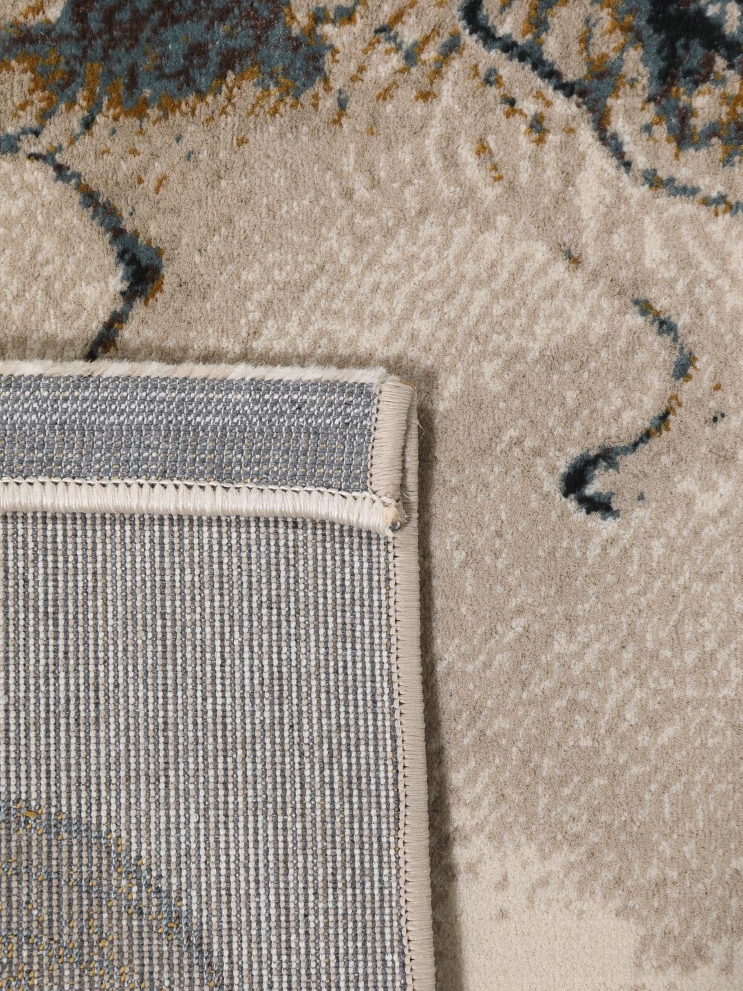 Beige tæppe med organisk blomstermotiv