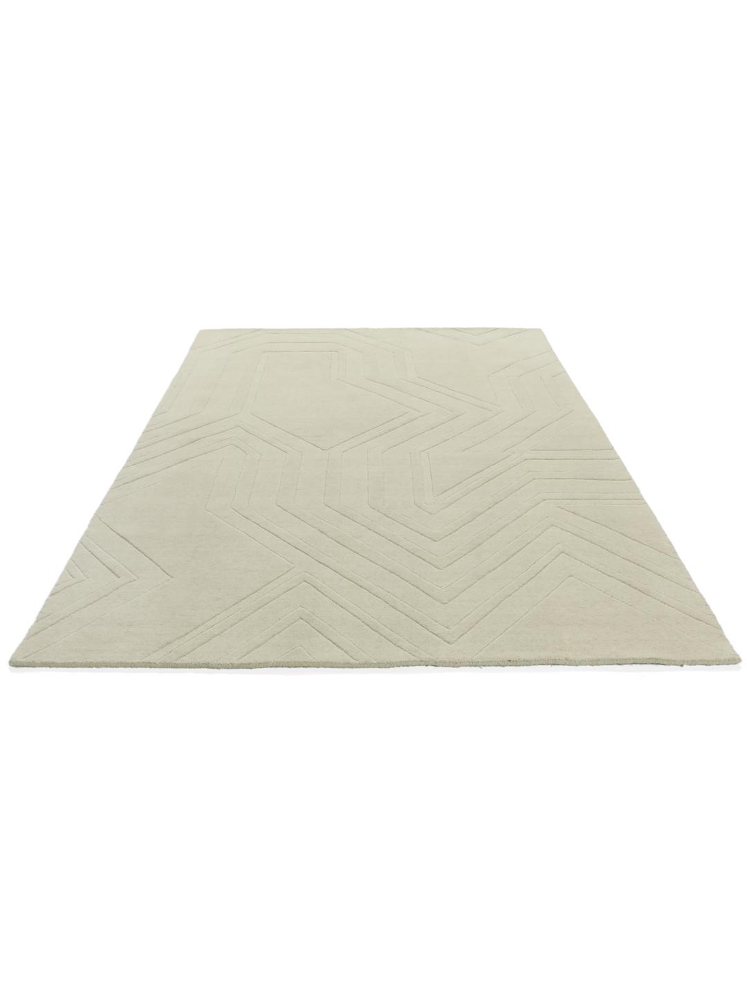 Wit handgeweven wollen tapijt met een subtiel geometrisch patroon