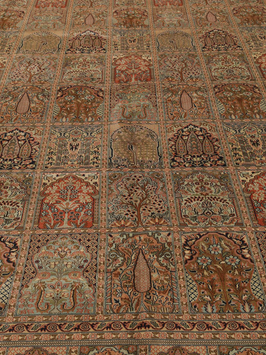 A luxurious hand-knotted Kashmir silk rug from India with an intricate beige garden panel design.