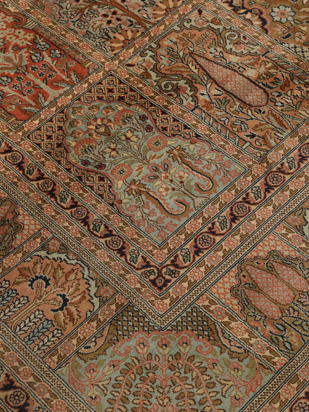 A luxurious hand-knotted Kashmir silk rug from India with an intricate beige garden panel design.