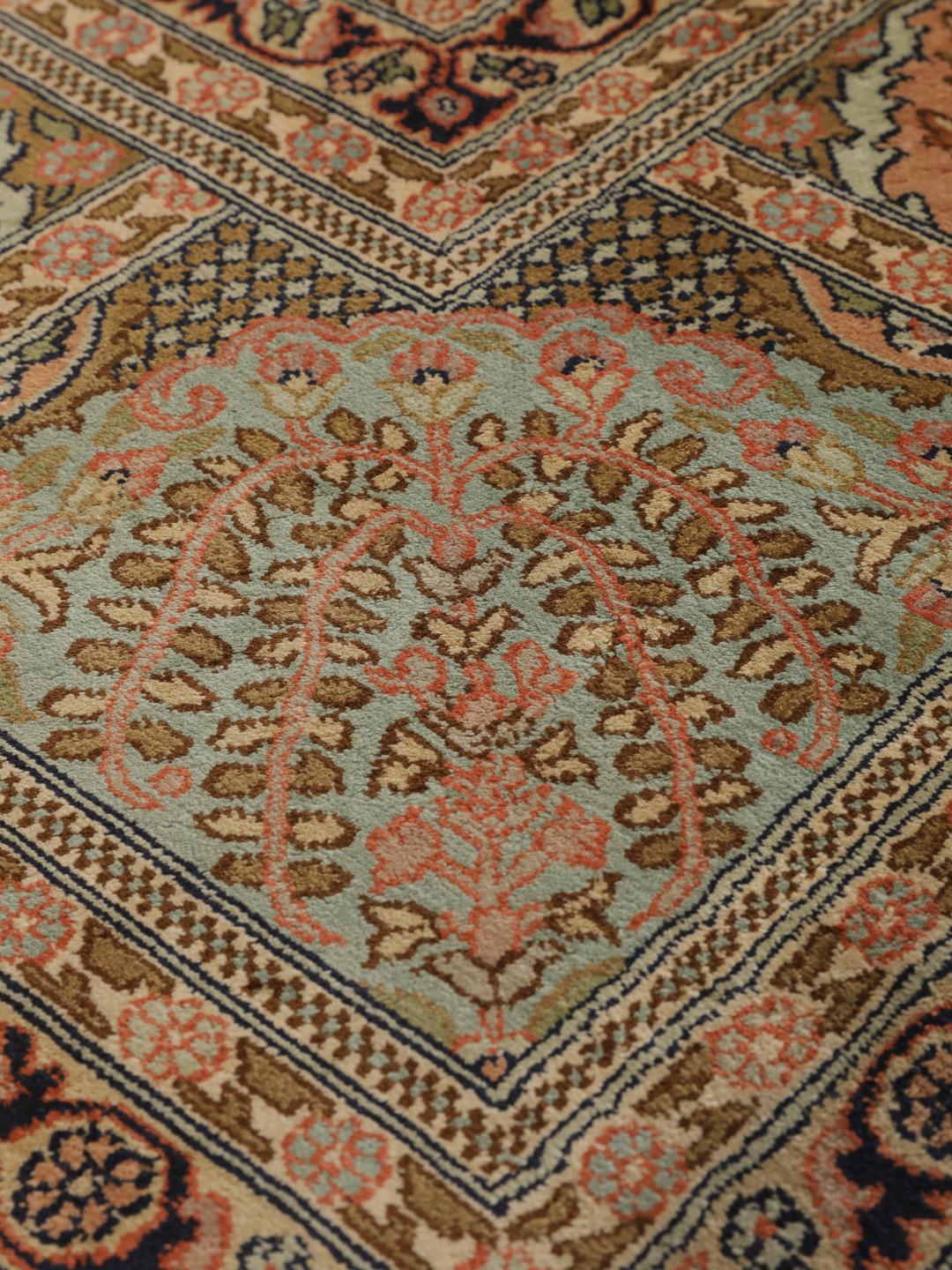 A luxurious hand-knotted Kashmir silk rug from India with an intricate beige garden panel design.