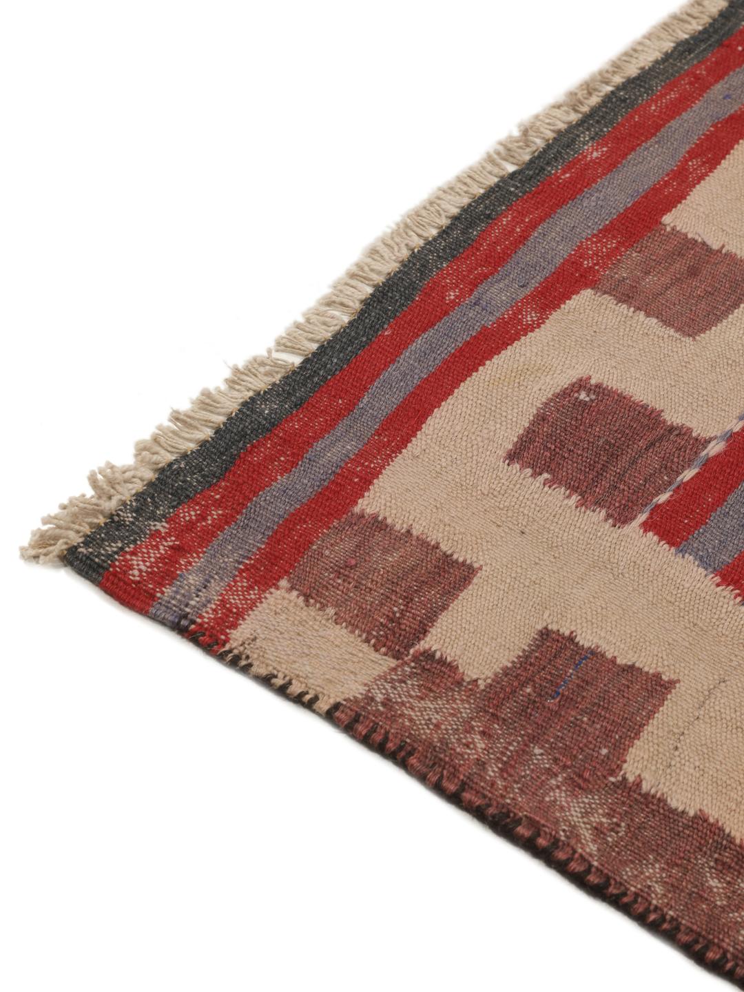 Tapis kelim vintage afghan tissé à la main avec des motifs géométriques en laine multicolore.