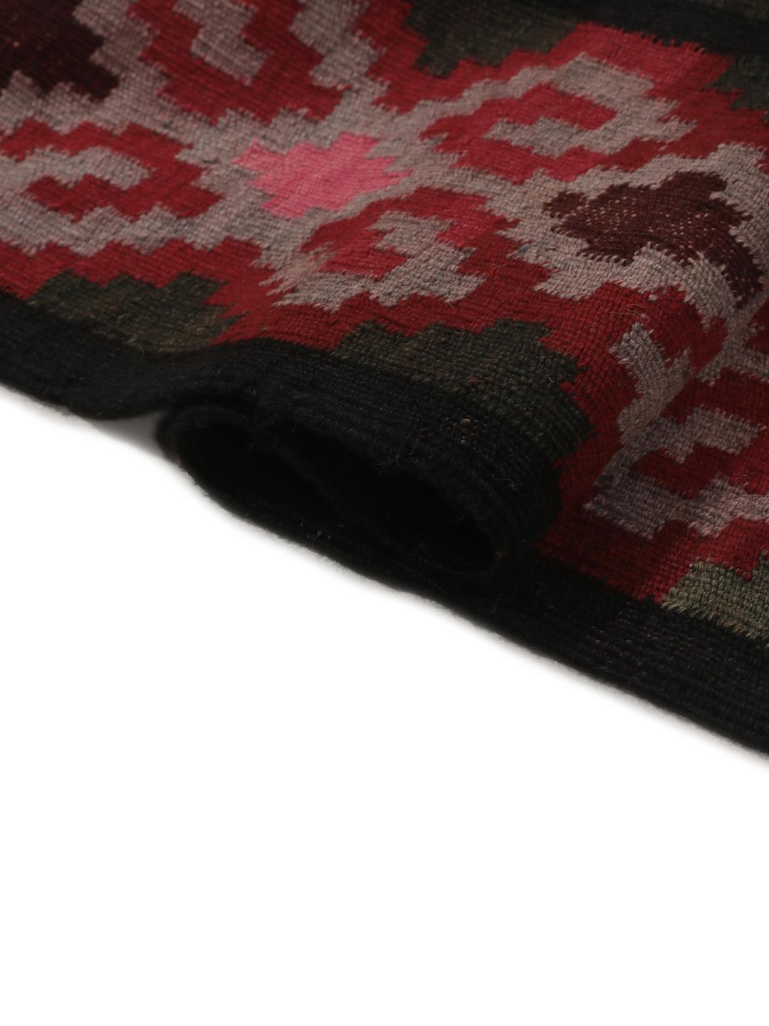 Tapis couloir afghan vintage avec des motifs géométriques en laine multicolore
