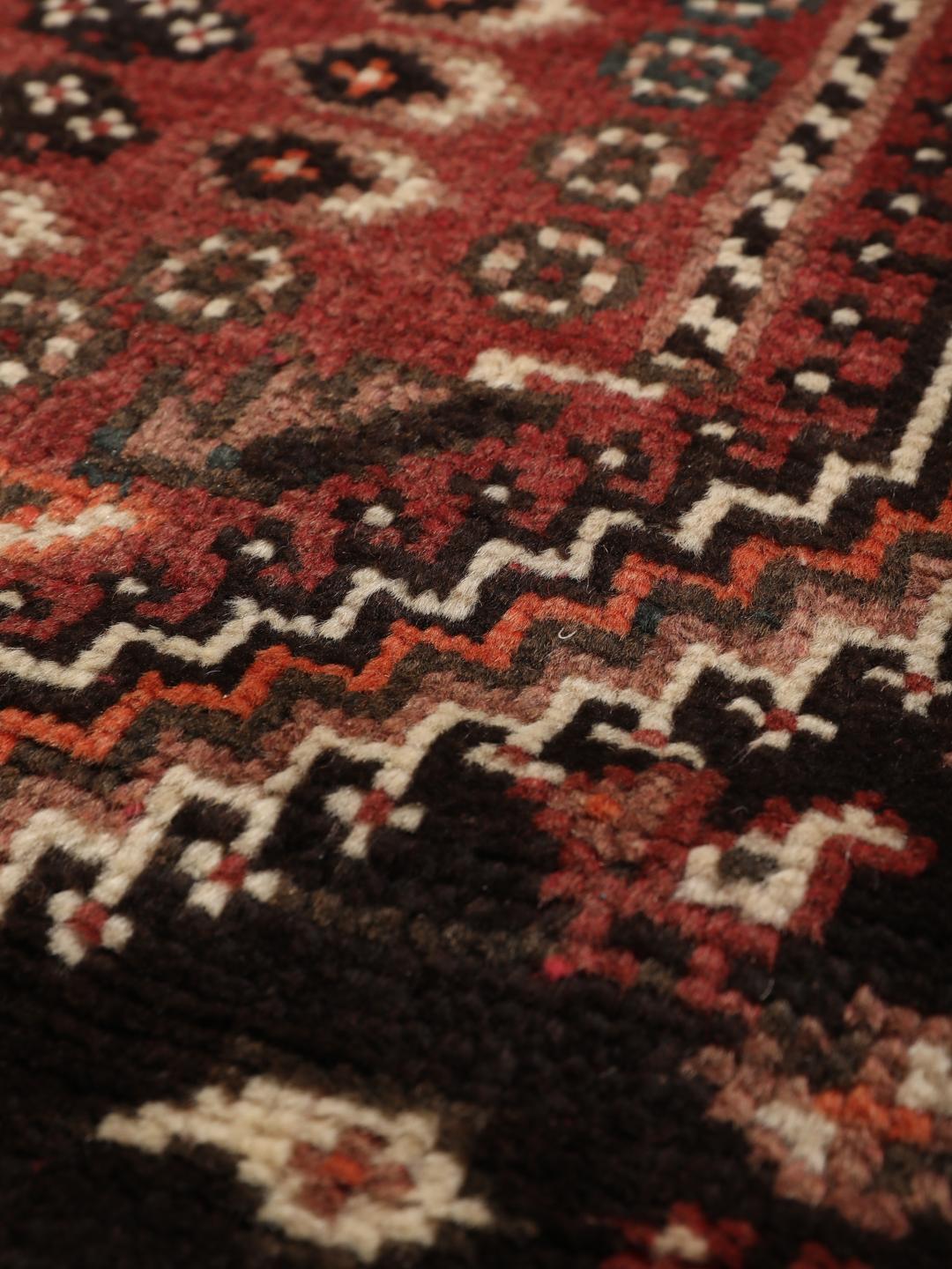 Hand-knotted Middle Eastern Shiraz runner in red and black wool
