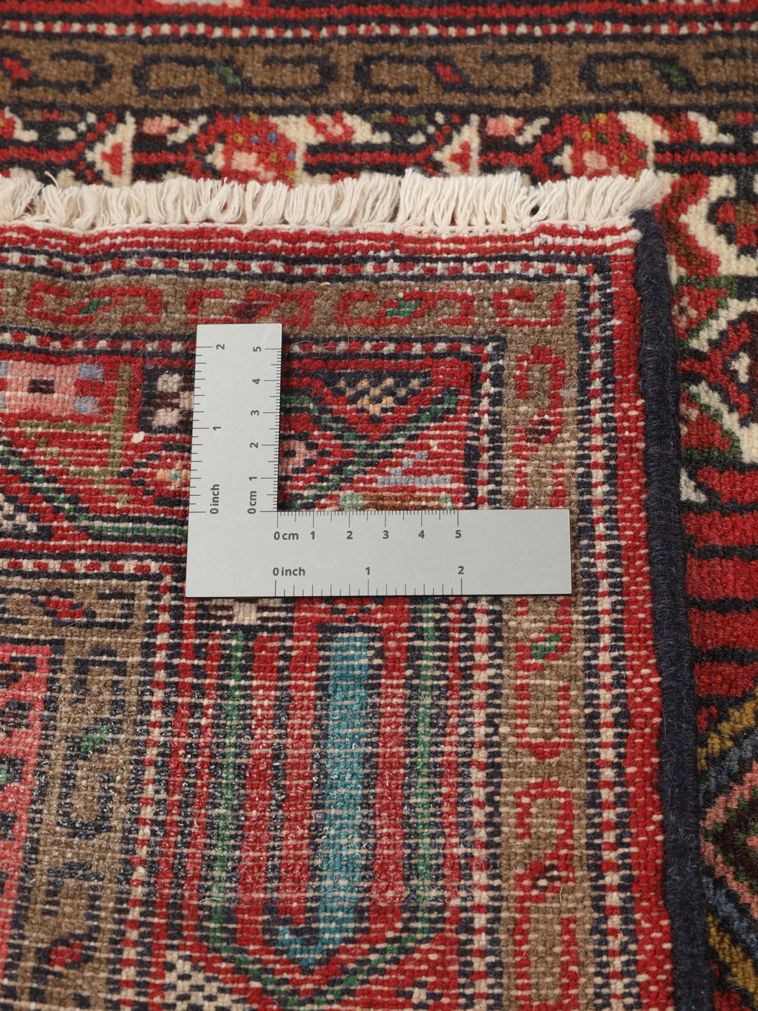 Handgeknoopte Hamadan loper uit het Midden-Oosten in rood- en beige tinten
