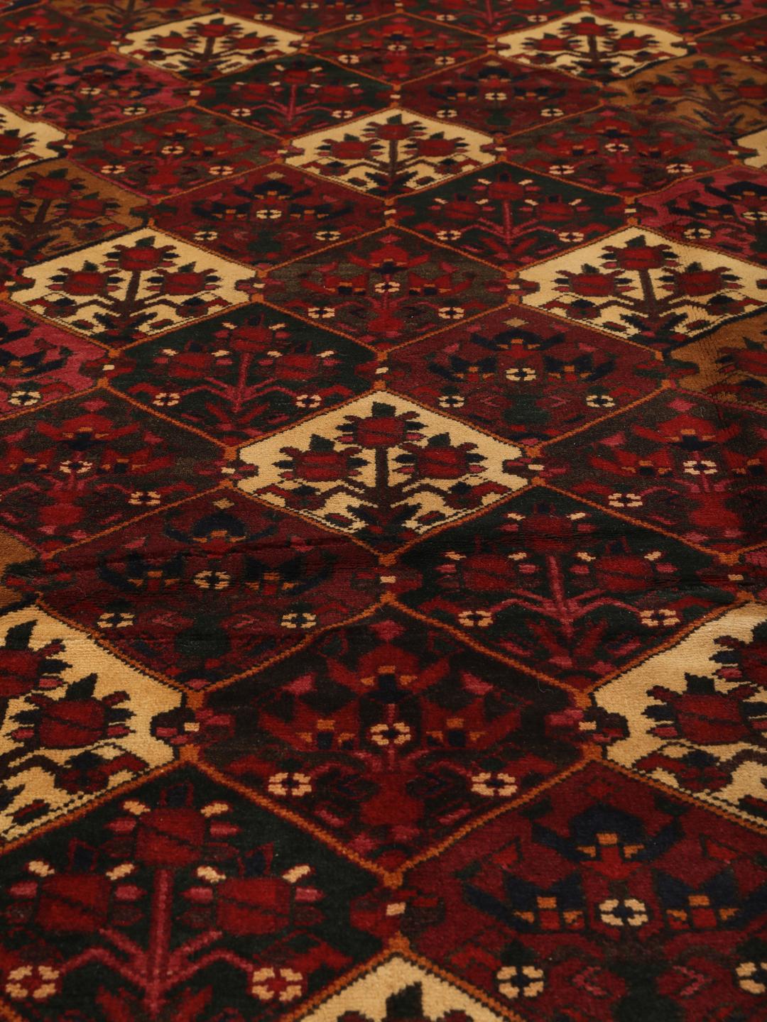 Hand-knotted Middle Eastern Bakhtiari rug in dark-red and cream tones