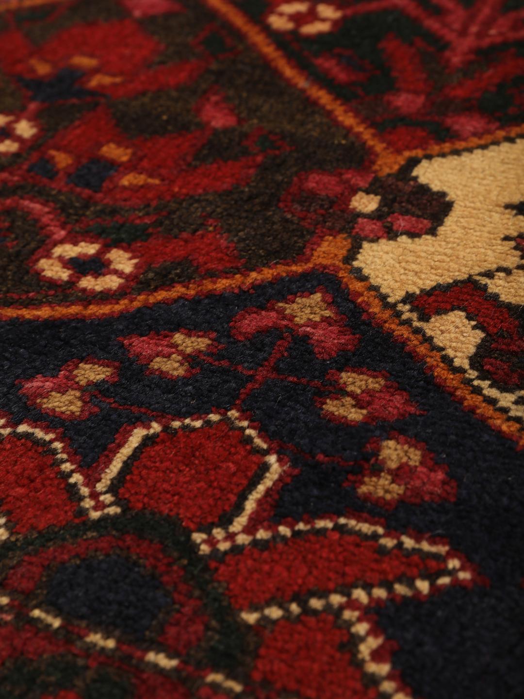 Hand-knotted Middle Eastern Bakhtiari rug in dark-red and cream tones