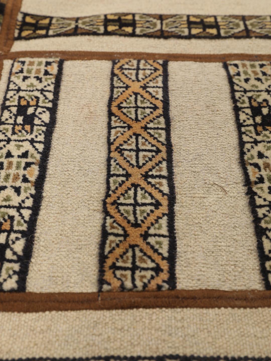 Tapis patchwork artisanal du Moyen-Orient dans des tons beige et marron