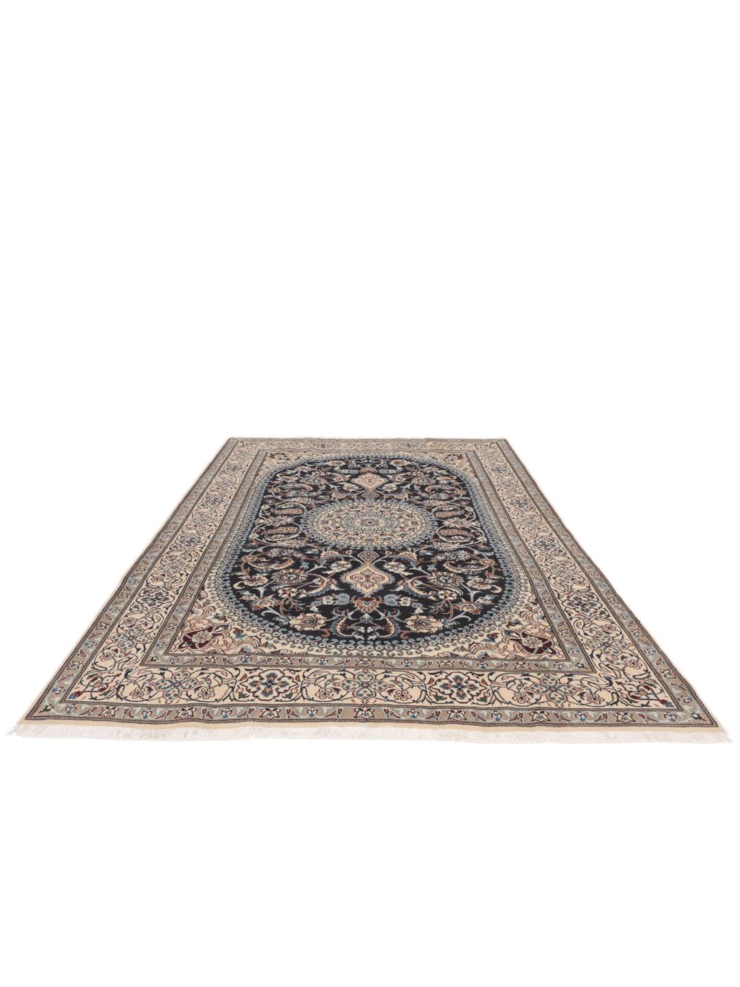 Hand-knotted Nain rug from the Middle East with a dark-blue and cream floral design.