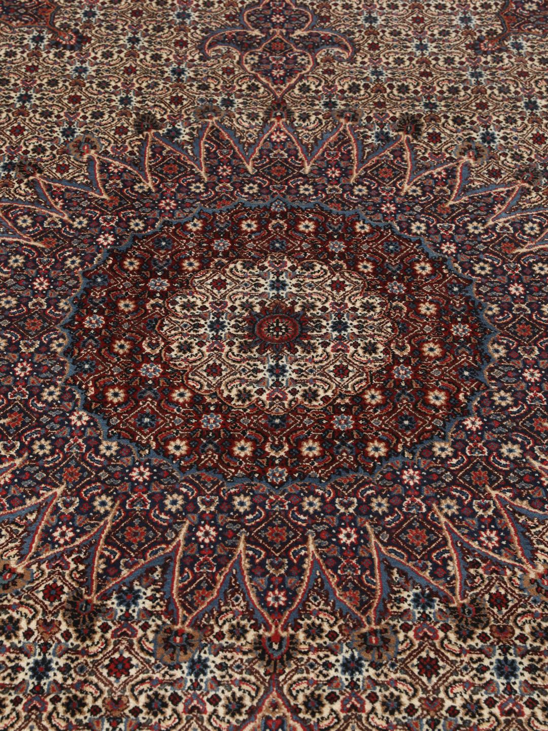 Hand-knotted Moud rug from the Middle East in dark-red and blue