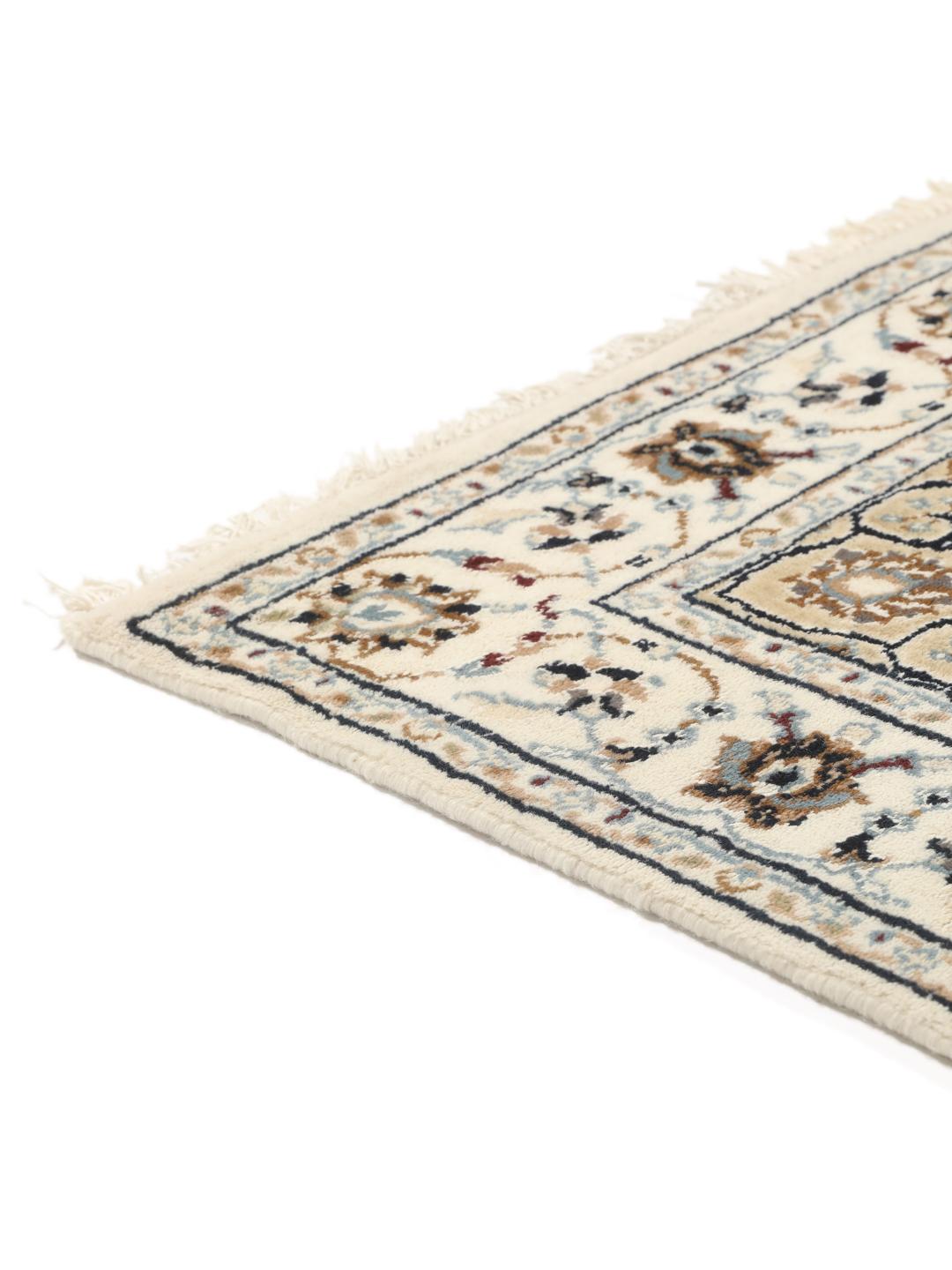 Met de hand geknoopte beige Nain loper uit India met bloemmotieven