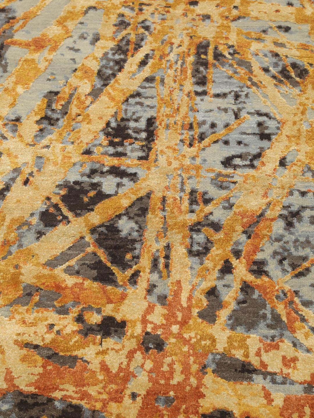 Handgeknoopt modern tapijt uit India in oranje en donkergrijze tinten