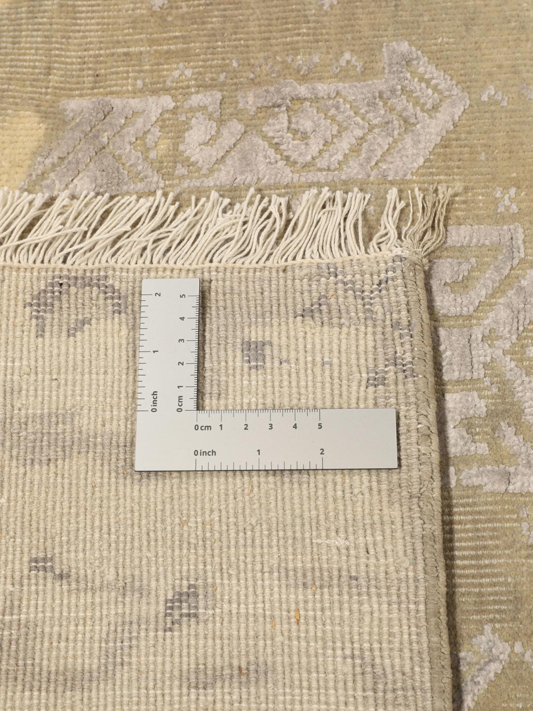 Håndknyttet moderne tæppe fra Indien i beige og bløde grå toner