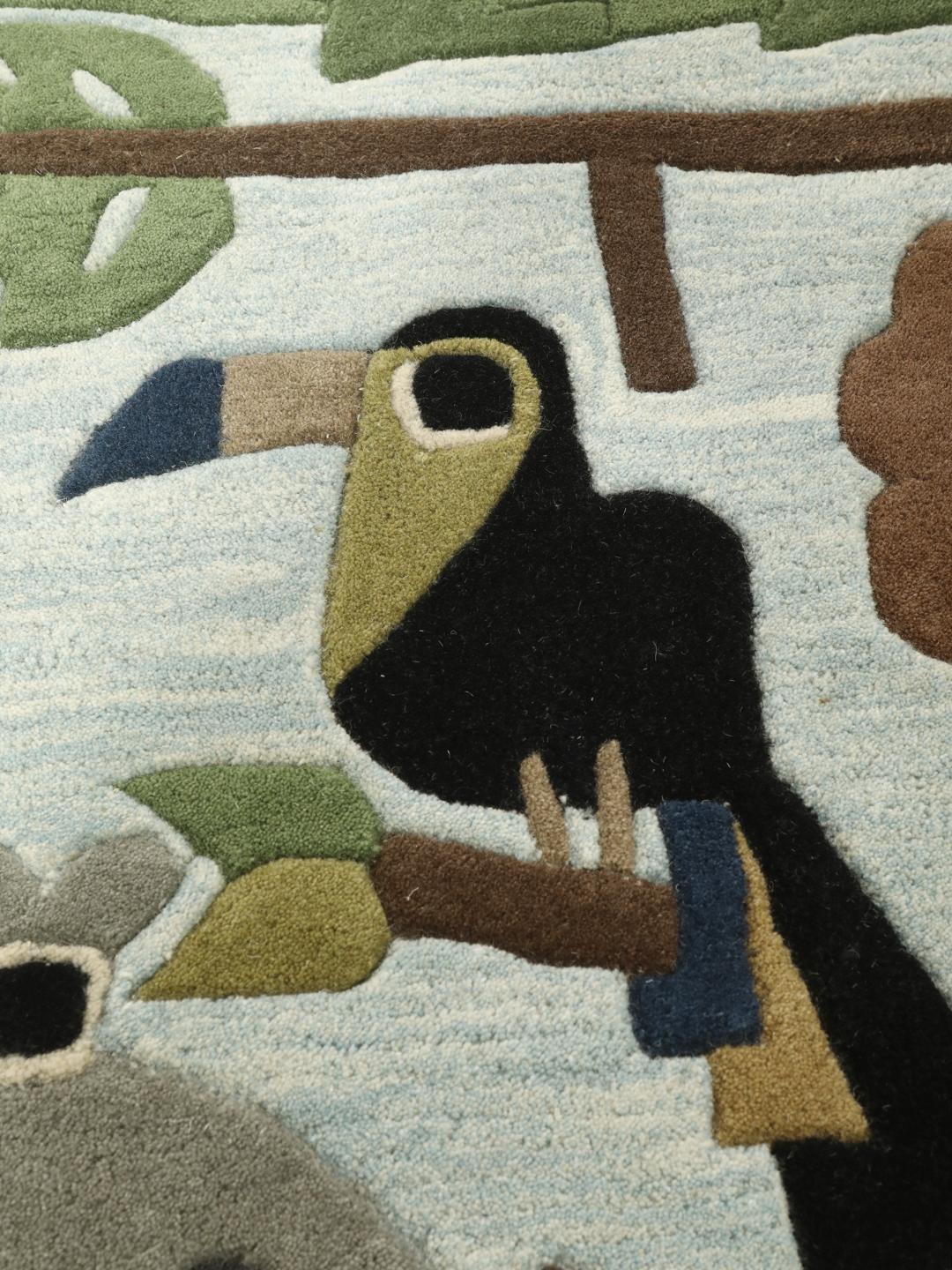 Tapis pour enfants bleu clair orné d'animaux de la jungle amicaux