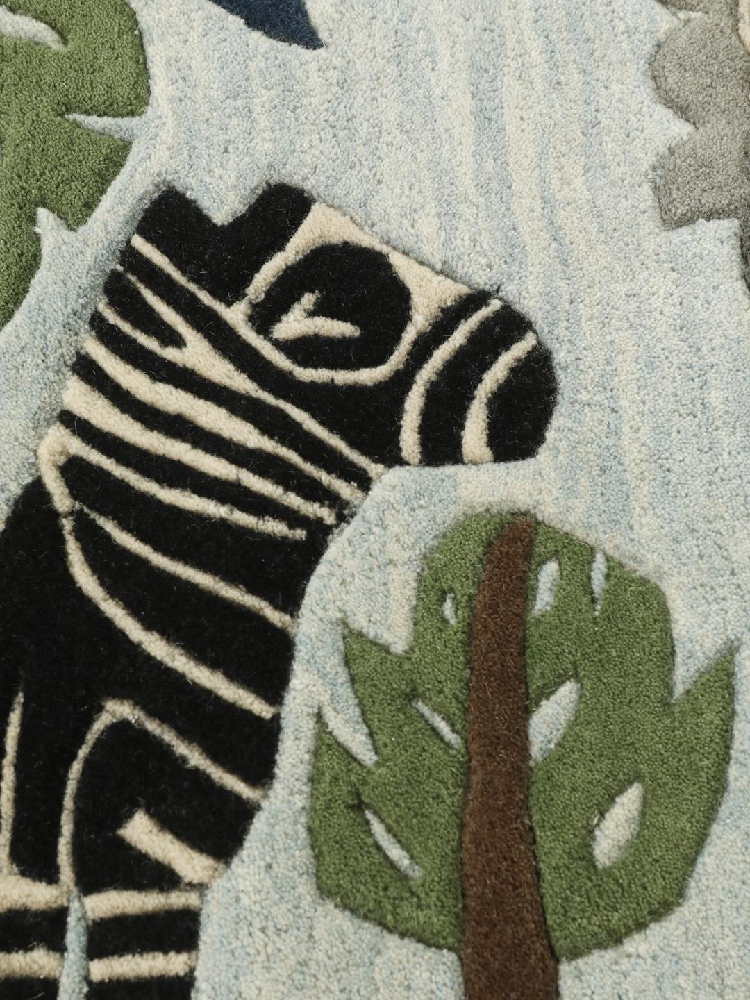 Tapis pour enfants bleu clair orné d'animaux de la jungle amicaux