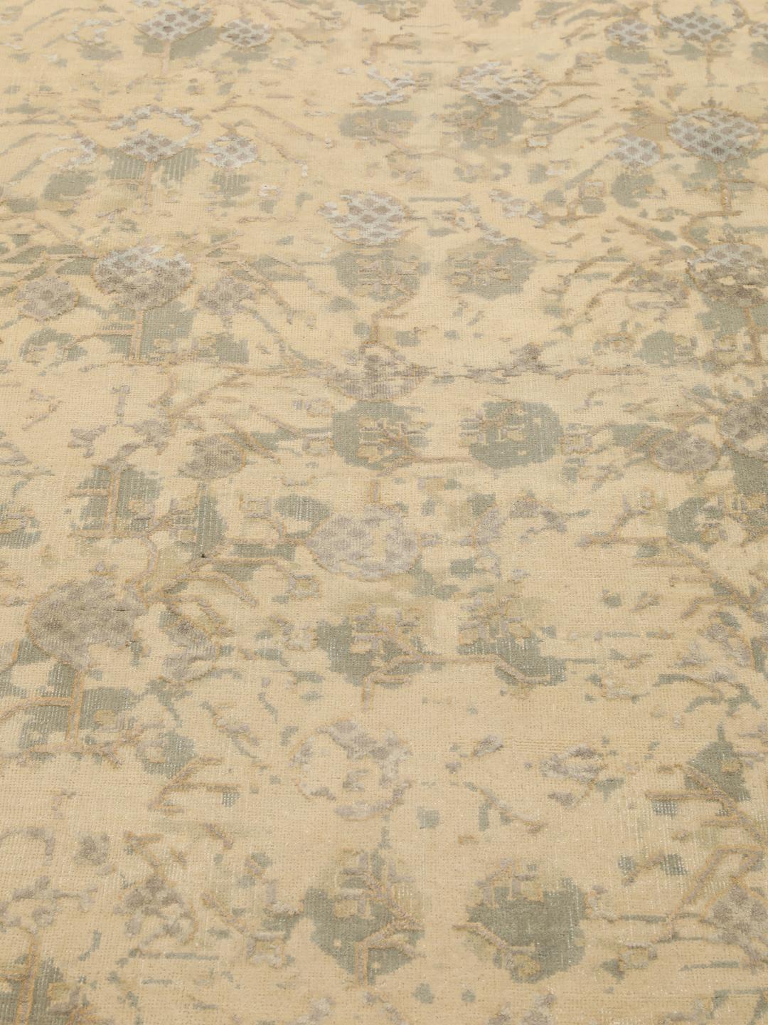 Håndknyttet indisk tæppe med moderne design i beige
