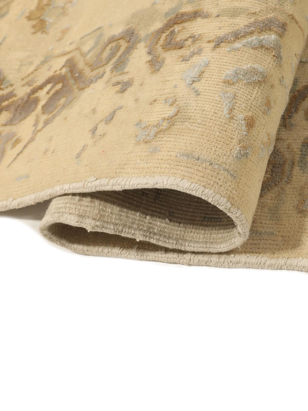 Håndknyttet indisk tæppe med moderne design i beige