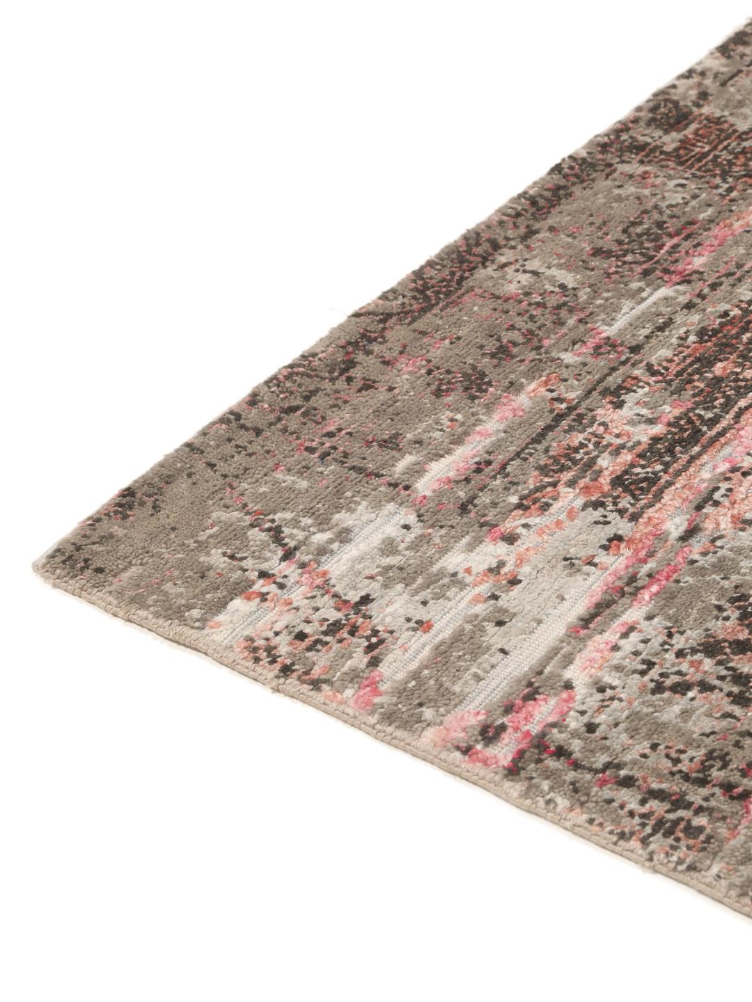 Et moderne håndknyttet tæppe fra Indien med et gråt og pink abstrakt design.