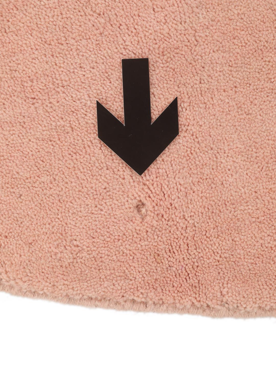 Rond lichtroze wollen vloerkleed