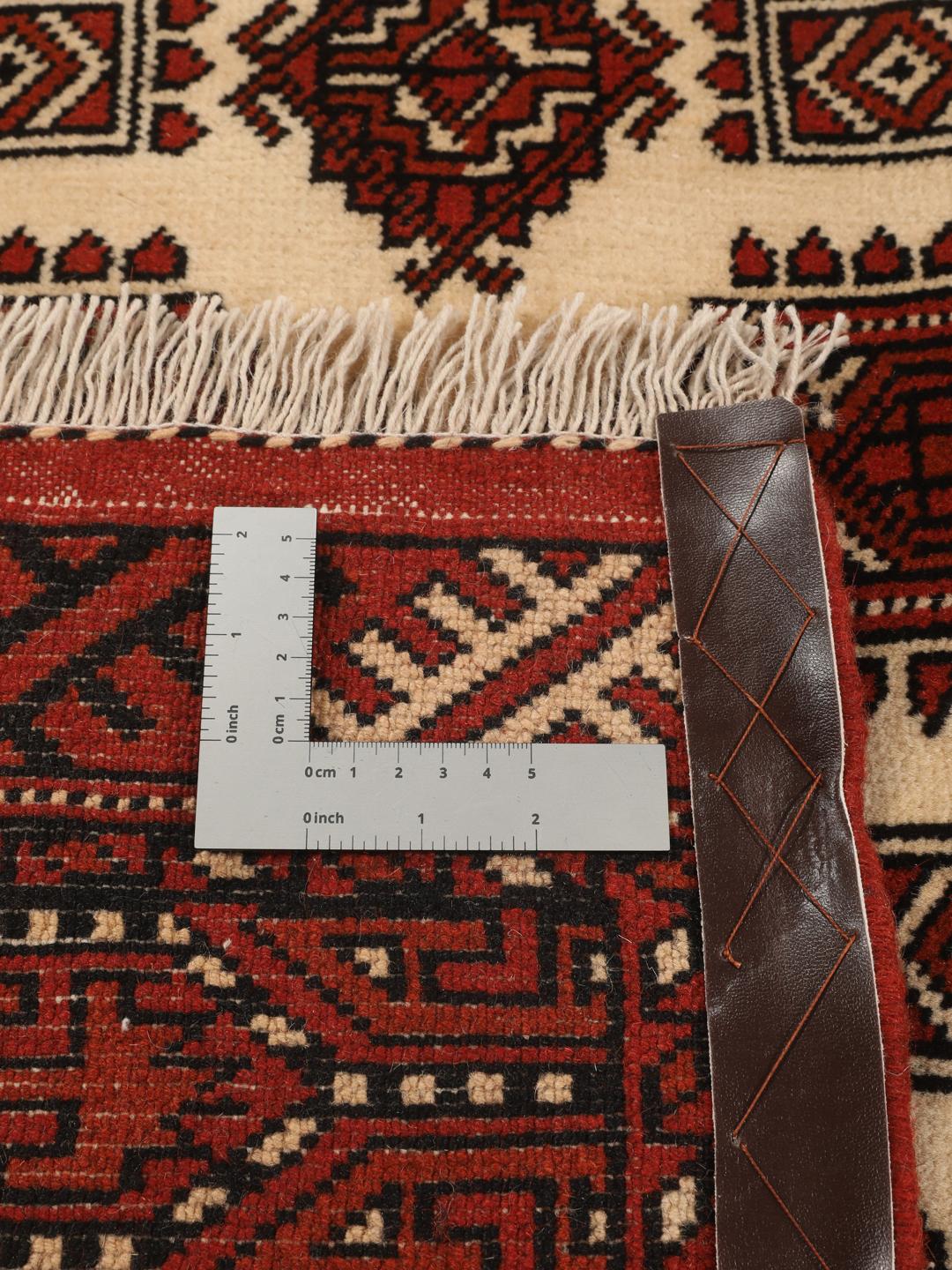 Handgeknoopt Turkaman wollen tapijt uit het Midden-Oosten in dieprode en beige tinten