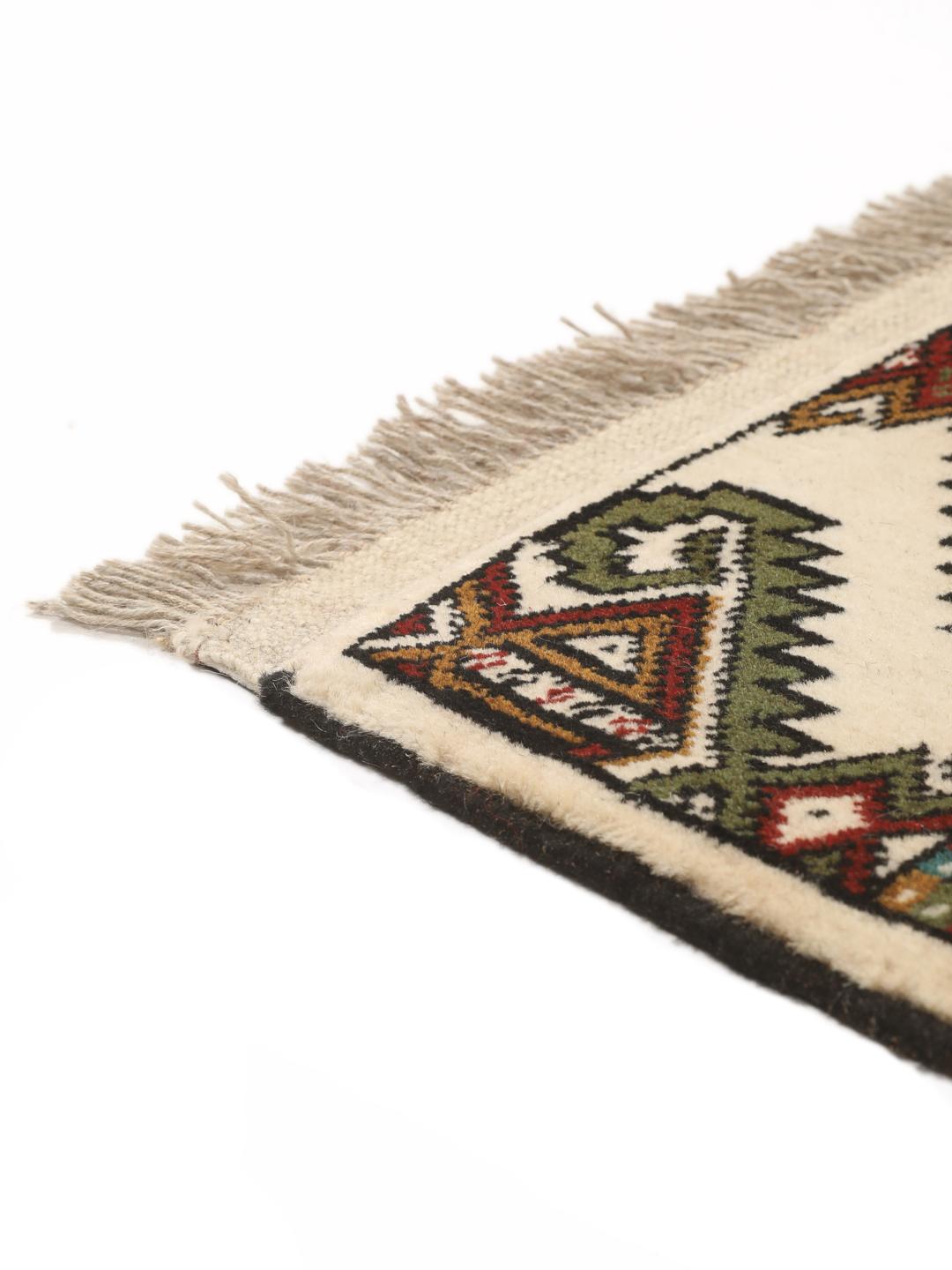 Hand-knotted Turkaman rug from the Middle East in red and beige tones.