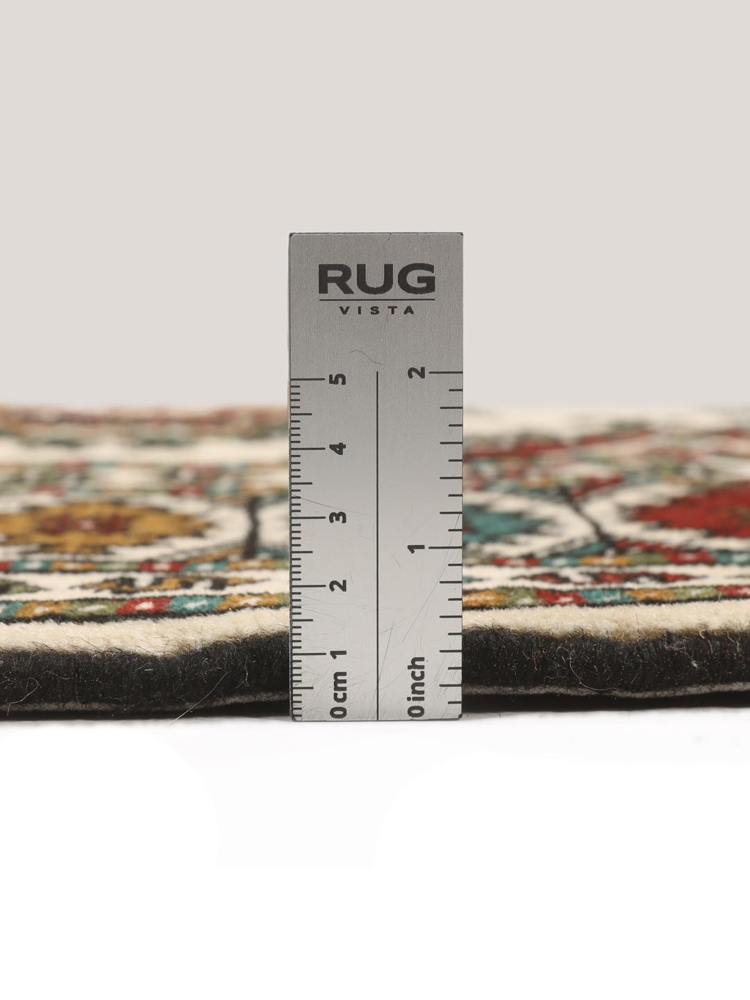 Hand-knotted Turkaman rug from the Middle East in red and beige tones.