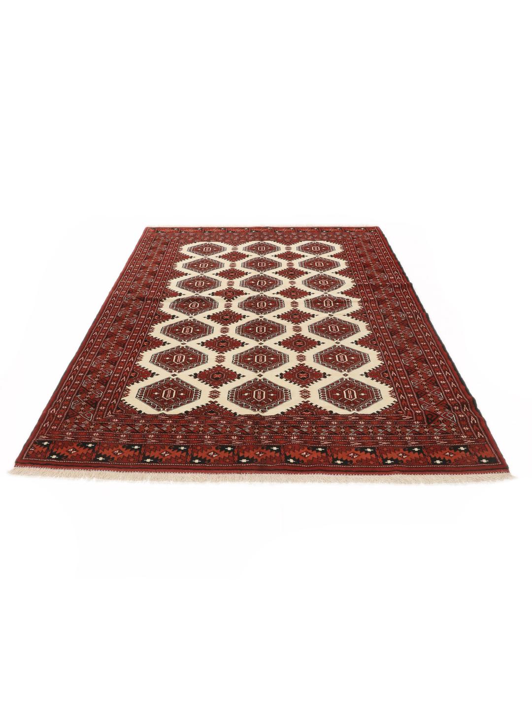 Hand-knotted Turkaman rug from the Middle East in shades of red and beige