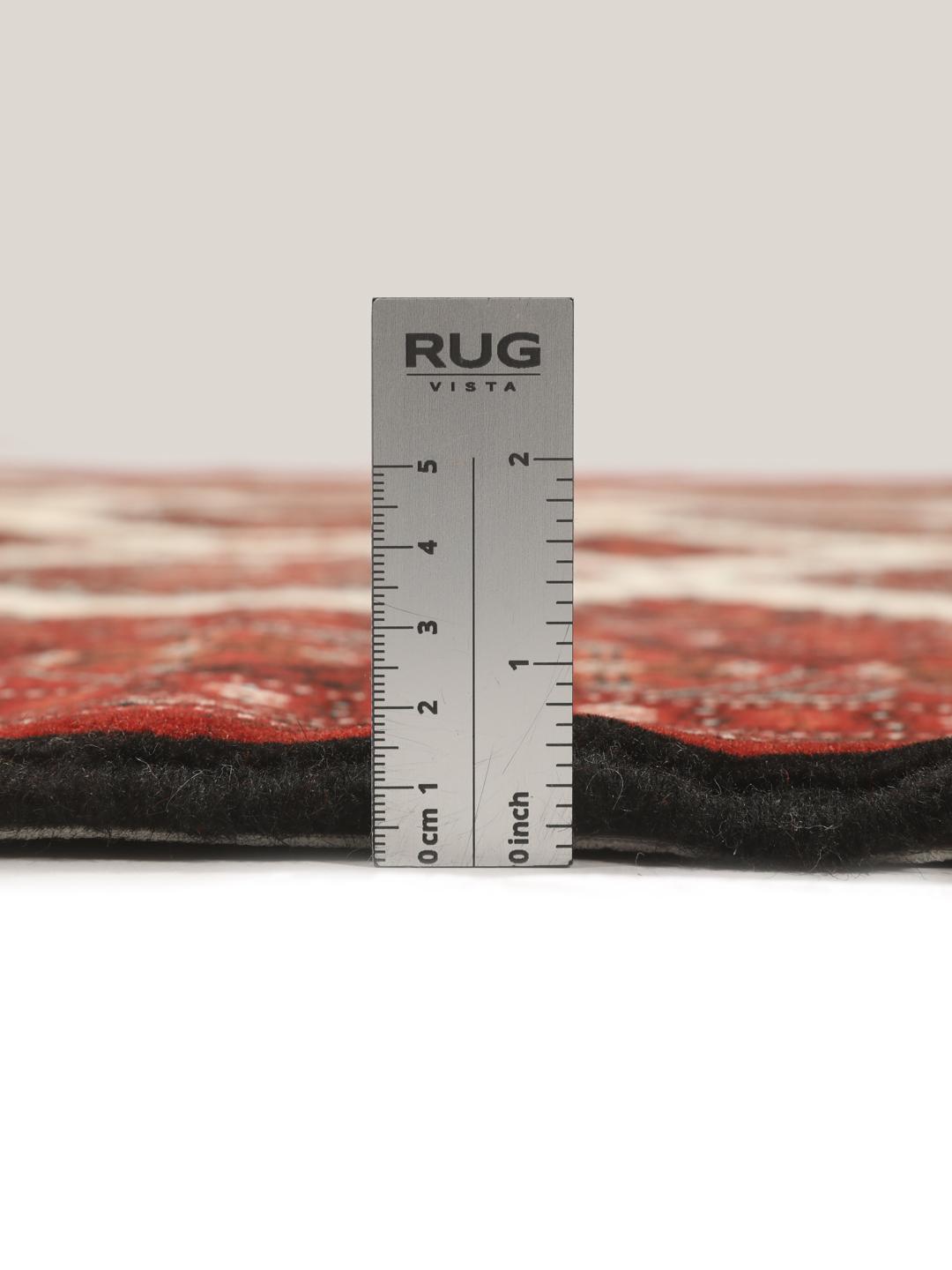 Hand-knotted Turkaman rug from the Middle East in shades of red and beige