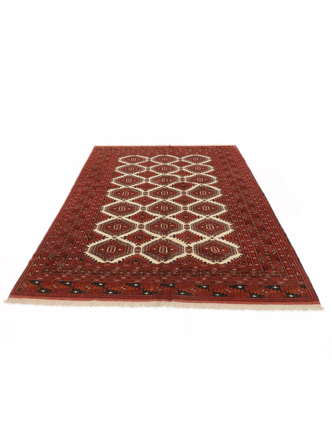 Hand-knotted Turkaman rug from the Middle East in deep red tones
