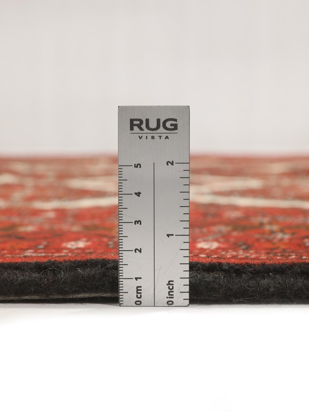 Hand-knotted Turkaman rug from the Middle East in deep red tones