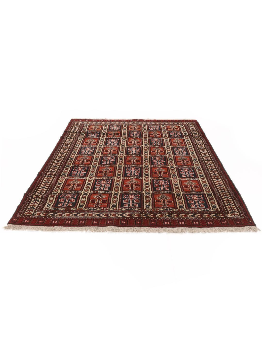 Hand-knotted Turkaman rug from the Middle East in red tones.