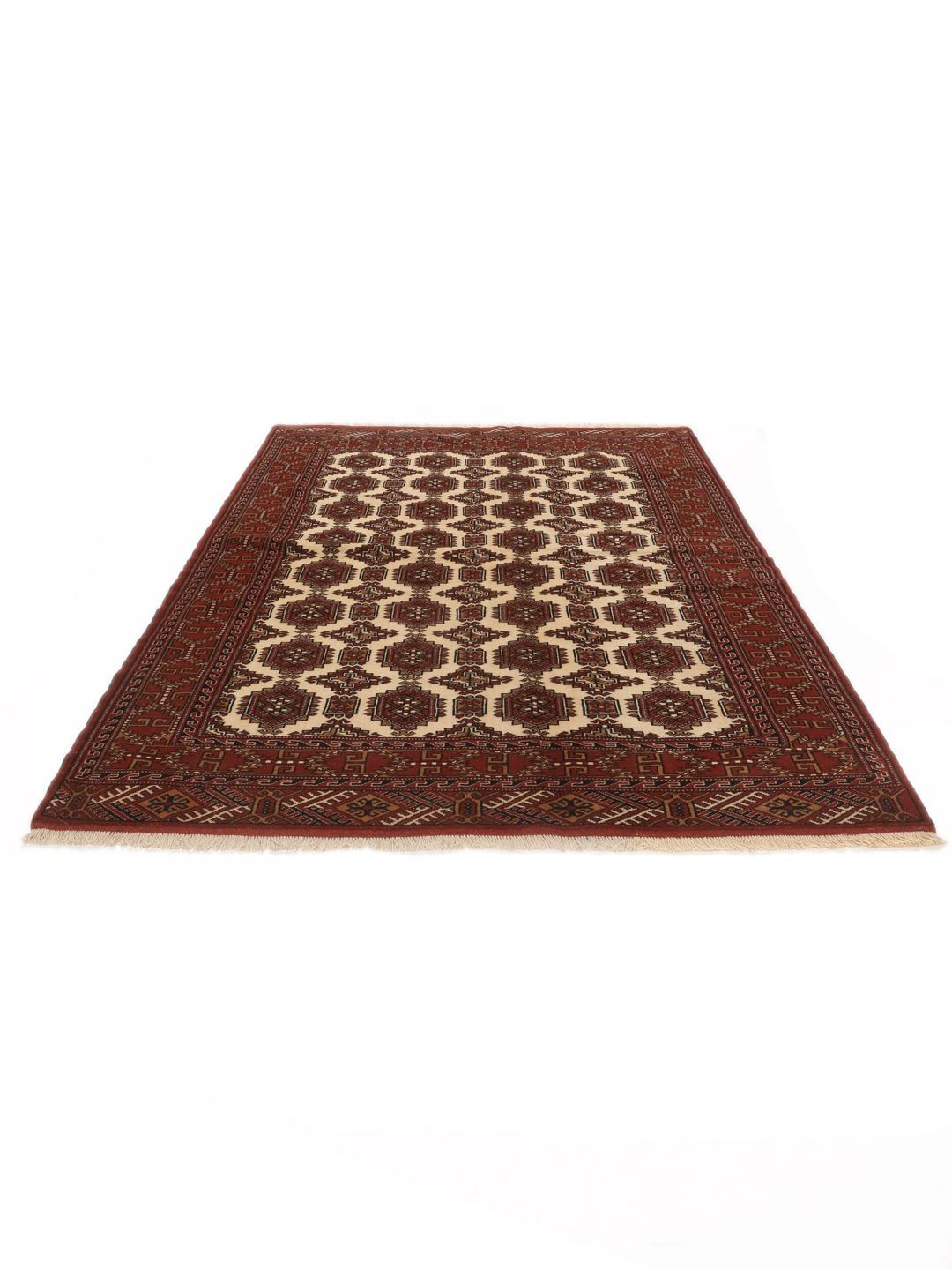 Hand-knotted Turkaman Wool rug with geometric patterns in red and beige from the Middle East.
