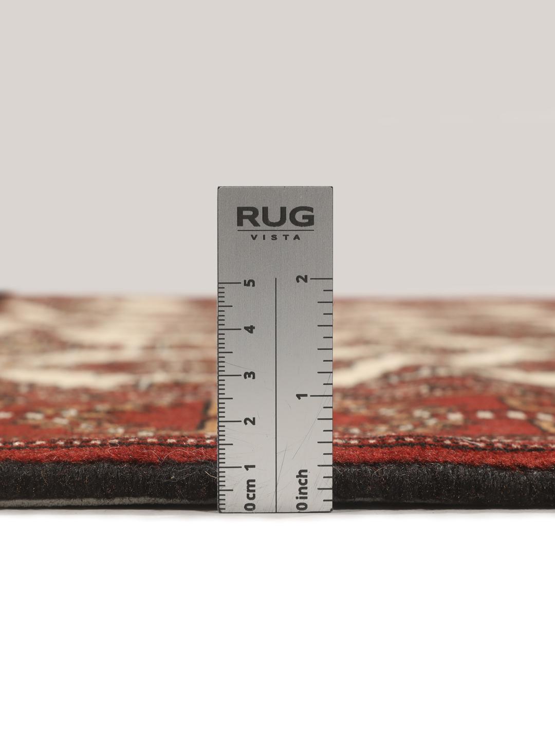 Hand-knotted Turkaman Wool rug with geometric patterns in red and beige from the Middle East.